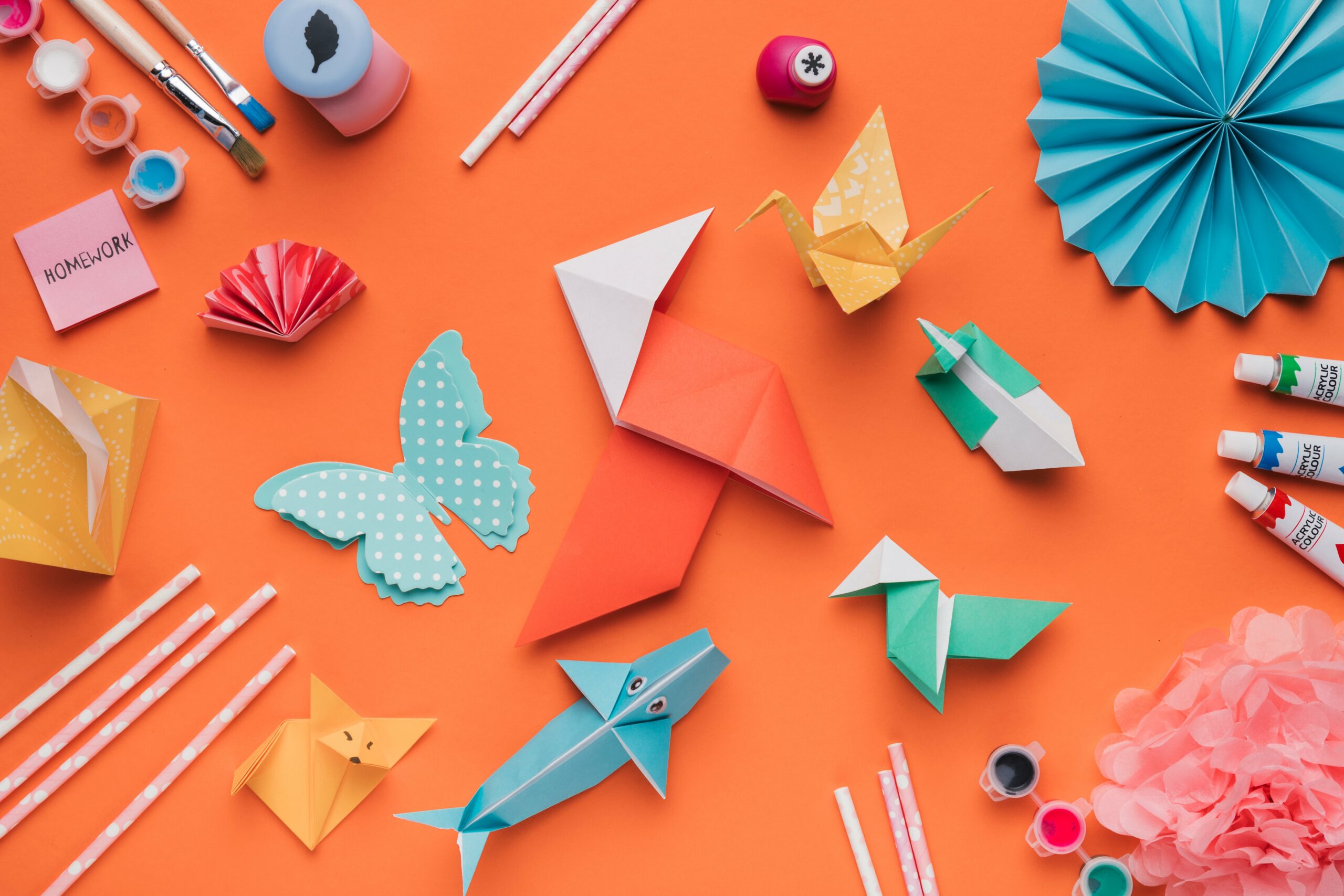set-origami-paper-art-paintbrush-watercolor-straw-orange-backdrop